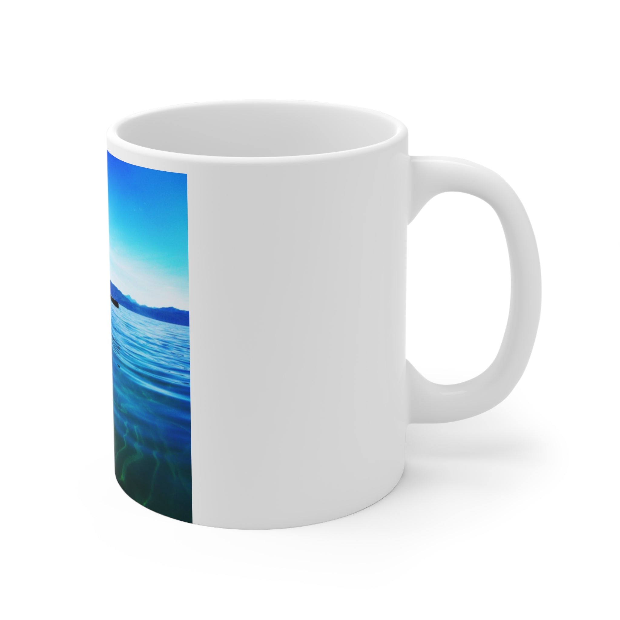 Kayak on Clear Blue Lake Mug | Scenic Water Photography